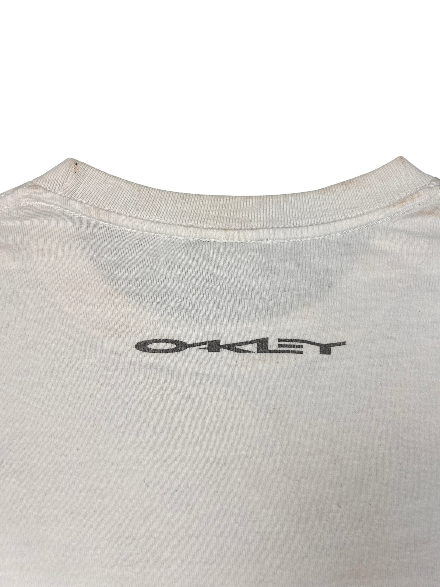 Small OAKLEY print below the back collar of the Software tee
