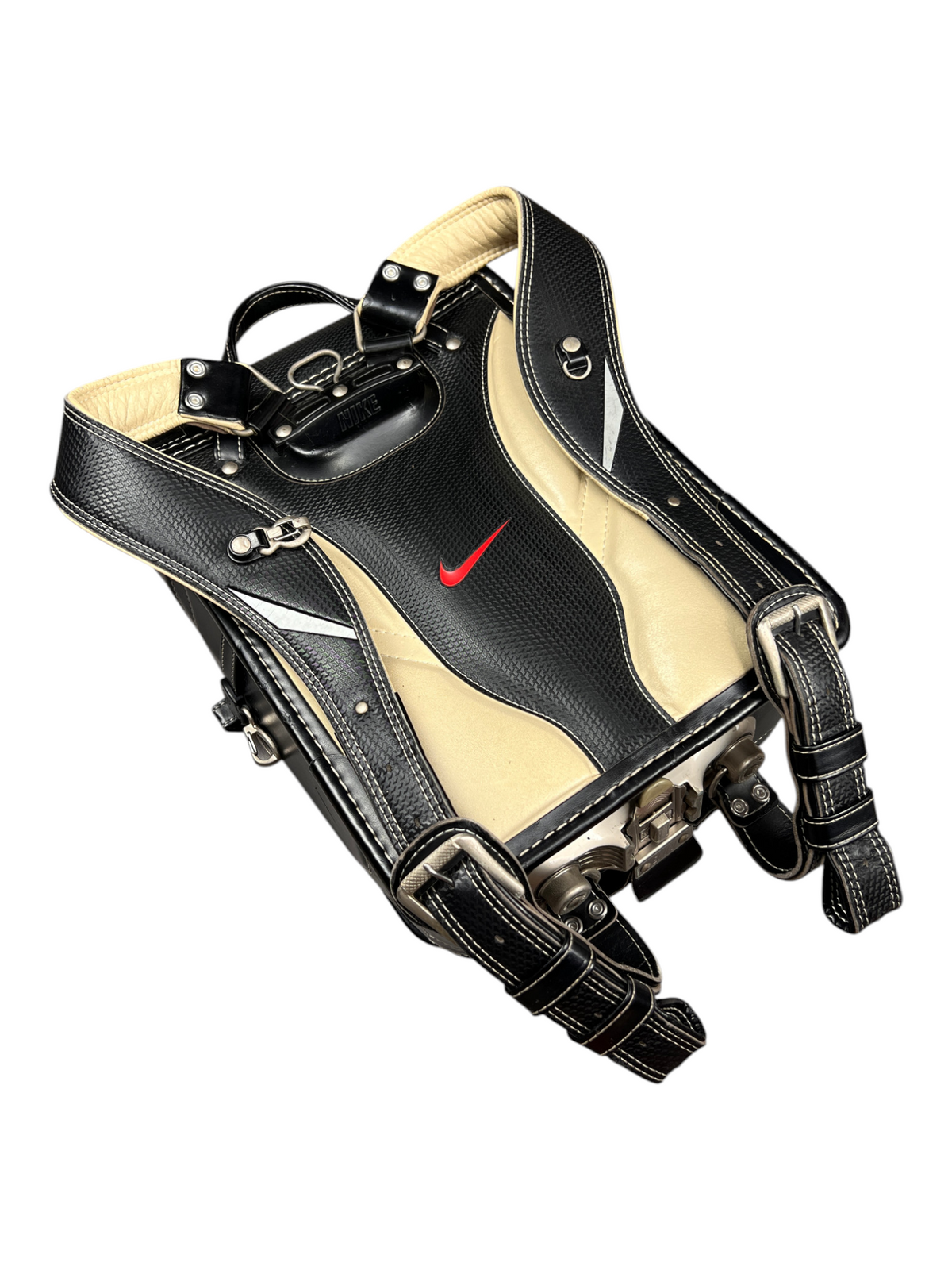 Nike Randoseru black and cream, red Swoosh - three-quarter view of straps and side hooks