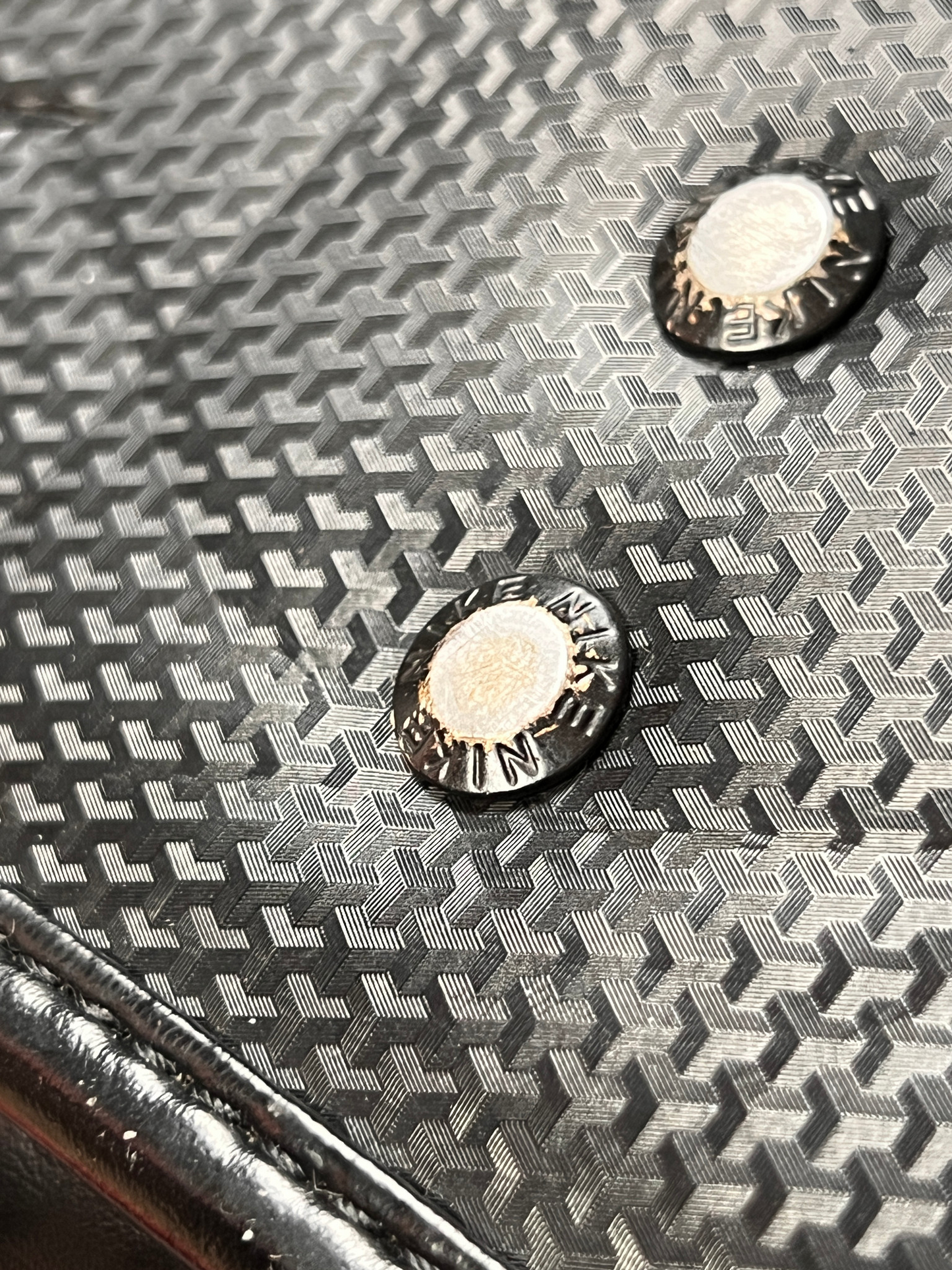 Nike Randoseru blackout - two metal studs on the patterned leather
