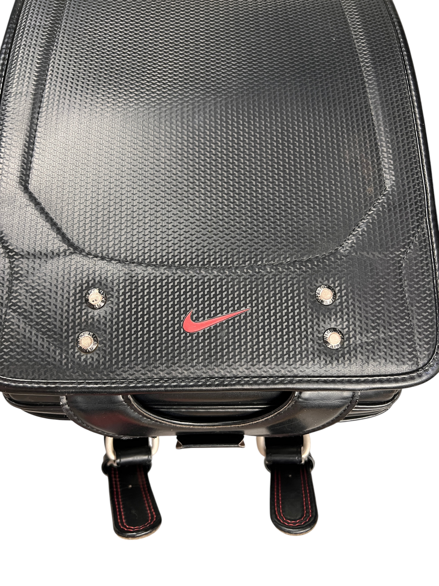 Nike Randoseru black and red - front flap close-up with rivets and red Swoosh