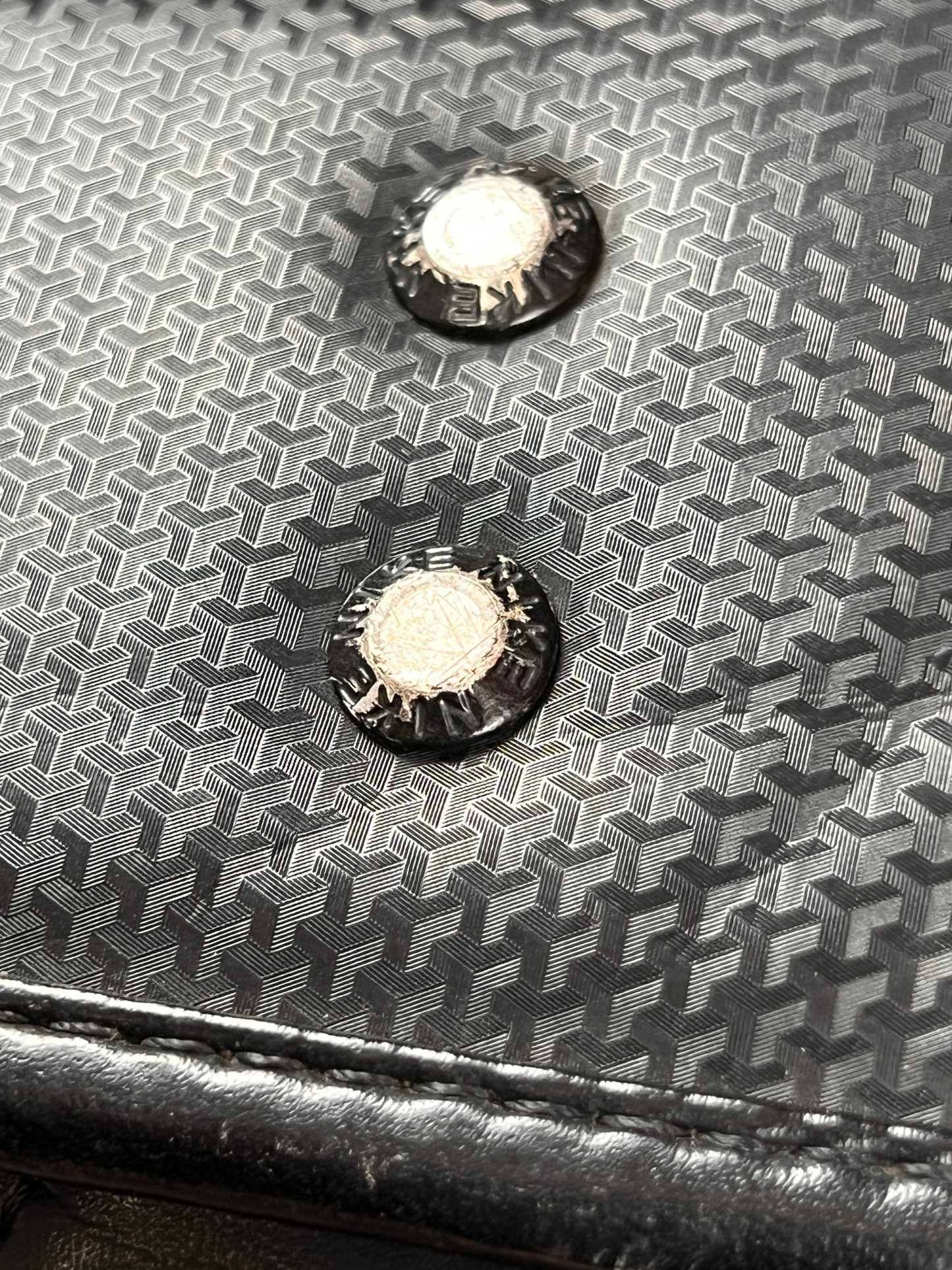 Nike Randoseru black and red - two metal studs on the patterned leather