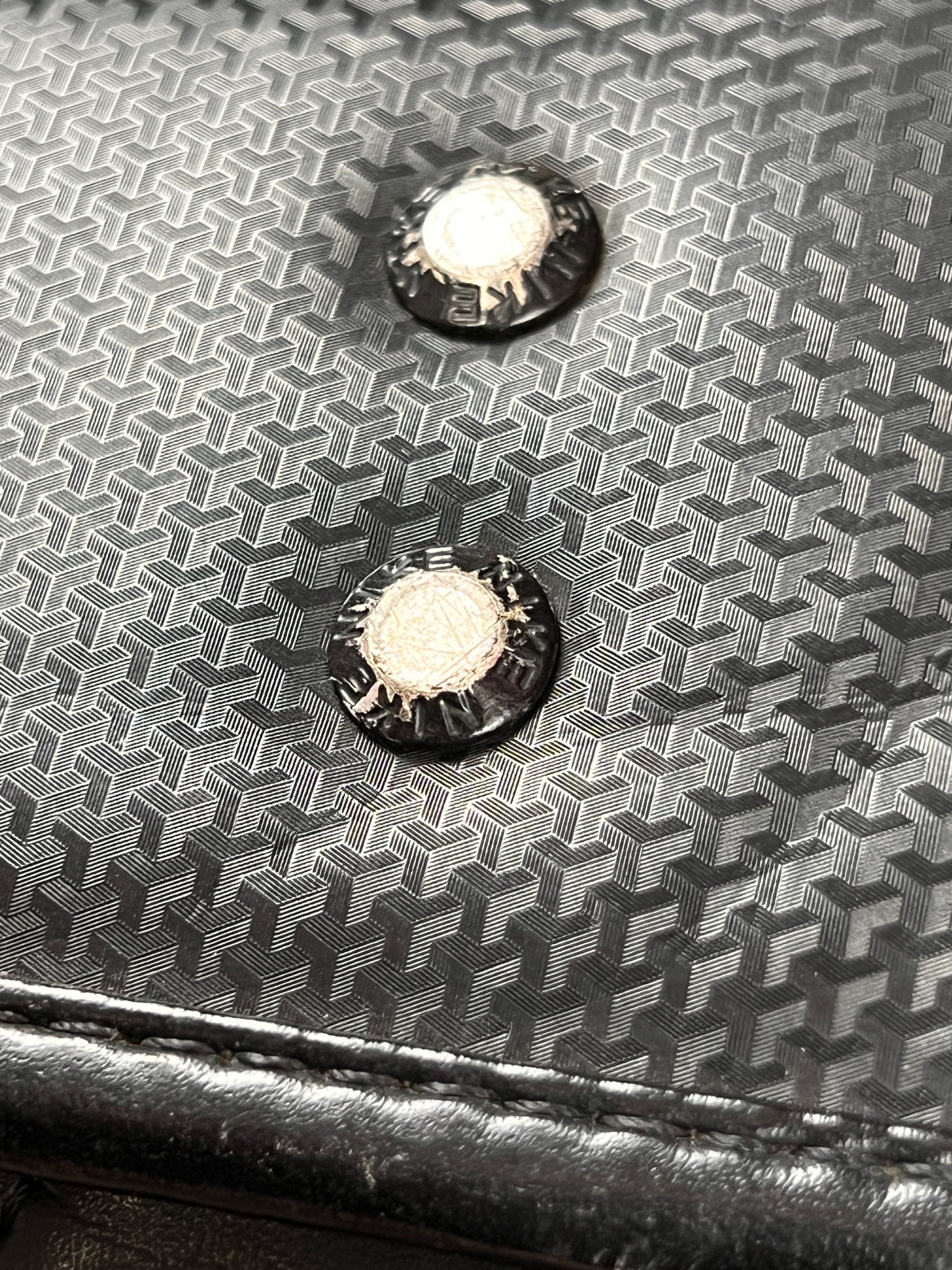 Nike Randoseru black and red - two metal studs on the patterned leather