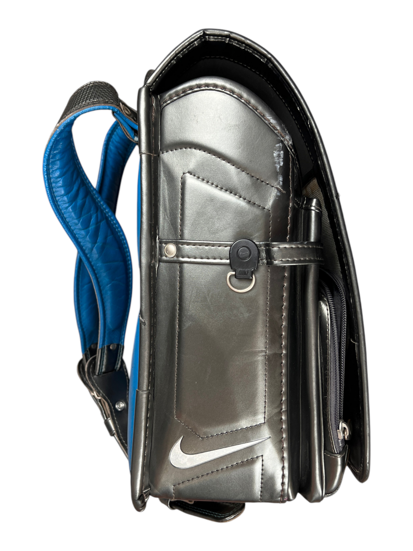 Nike Randoseru metallic charcoal and blue - side profile with the flap closed