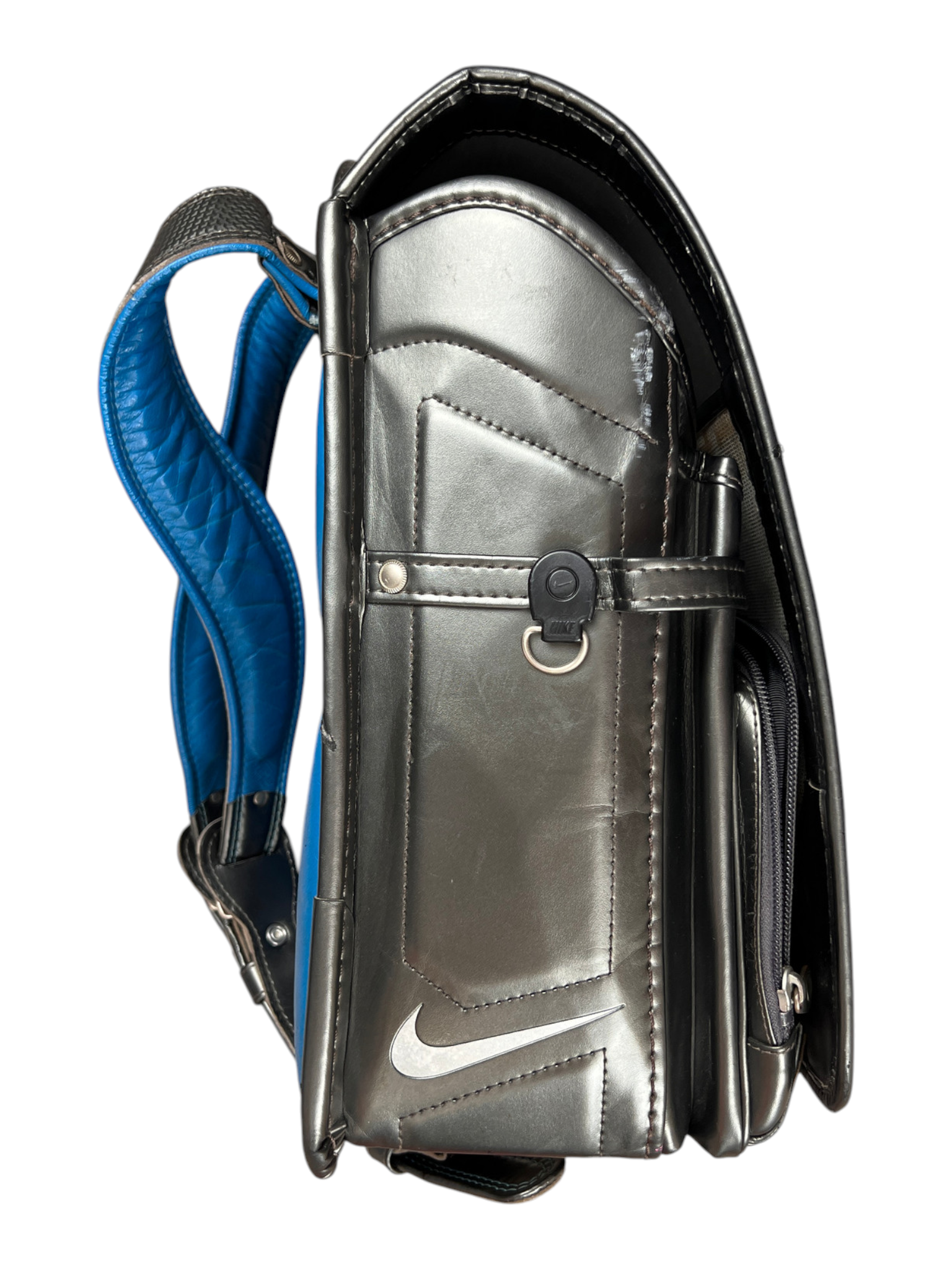 Nike Randoseru metallic charcoal and blue - side profile with the flap closed