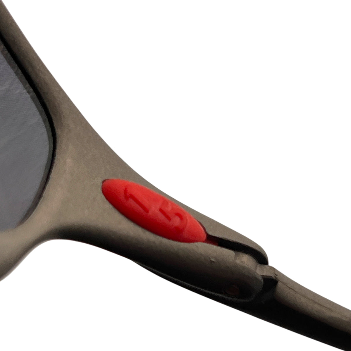 Red Oakley icon on the X-Metal frame, right side