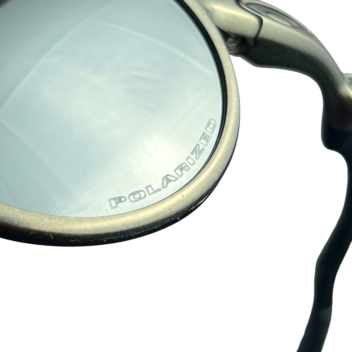 POLARIZED etched on the black lens of the Oakley Madman