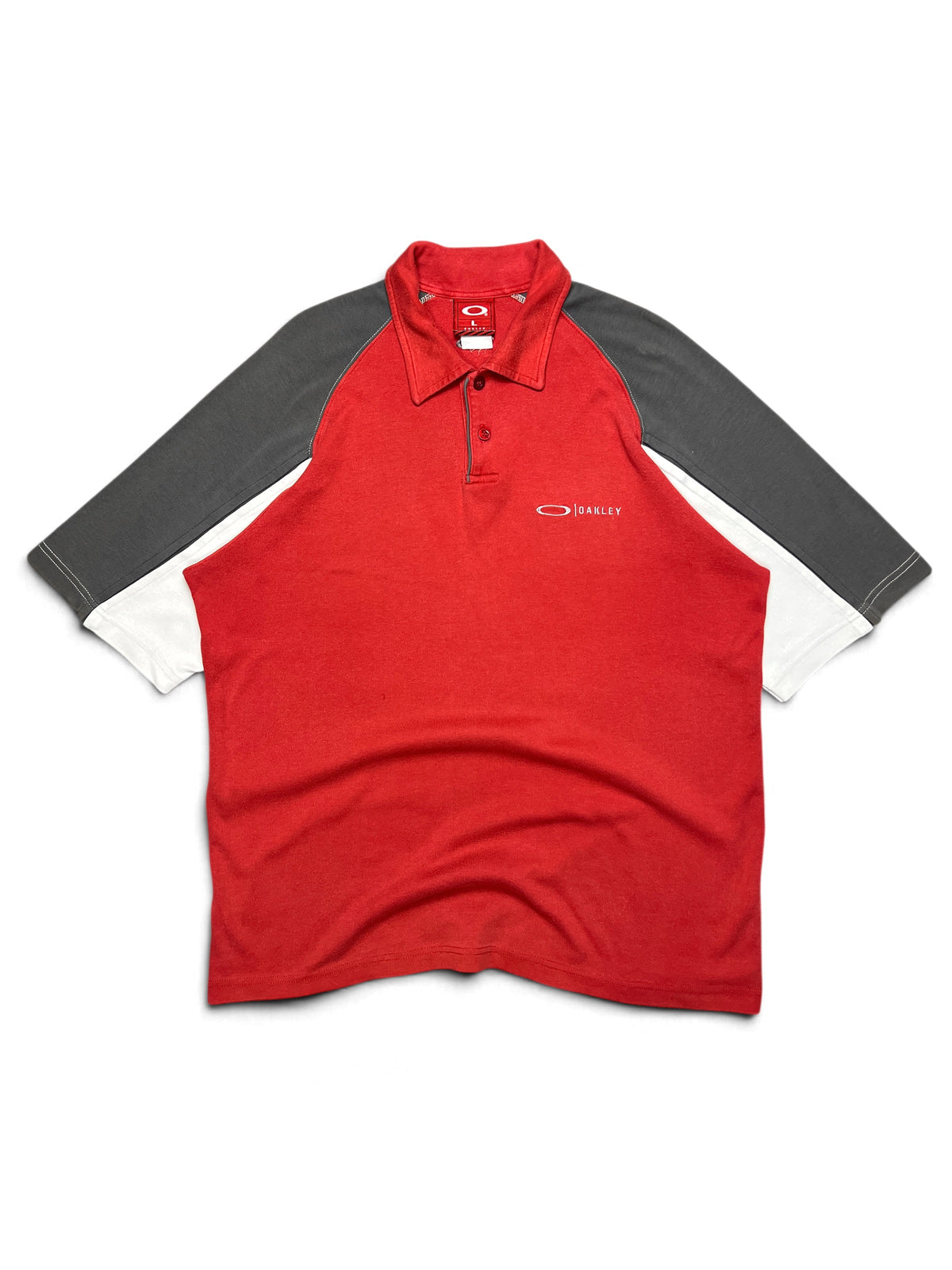 Vintage Oakley 2000s polo, red with grey raglan sleeves, red tag, size L