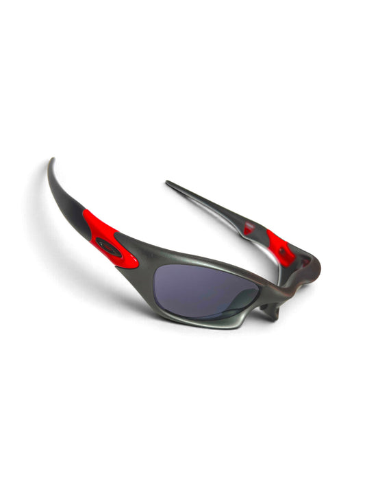 Oakley Valve Ducati Limited Edition 12-638, three-quarter view, Dark Grey frame with Black Iridium lenses and Ducati-red ear socks
