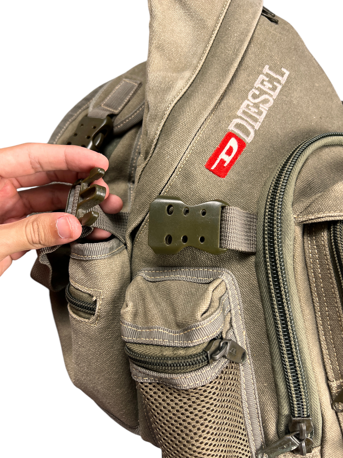 Six-hole polymer slider and webbing on the Diesel tactical bag